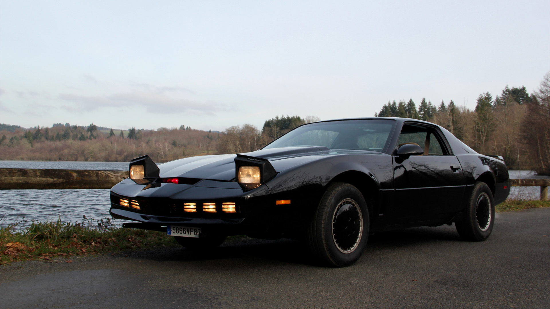 decorative: black car on a road reminiscent of Knight Rider