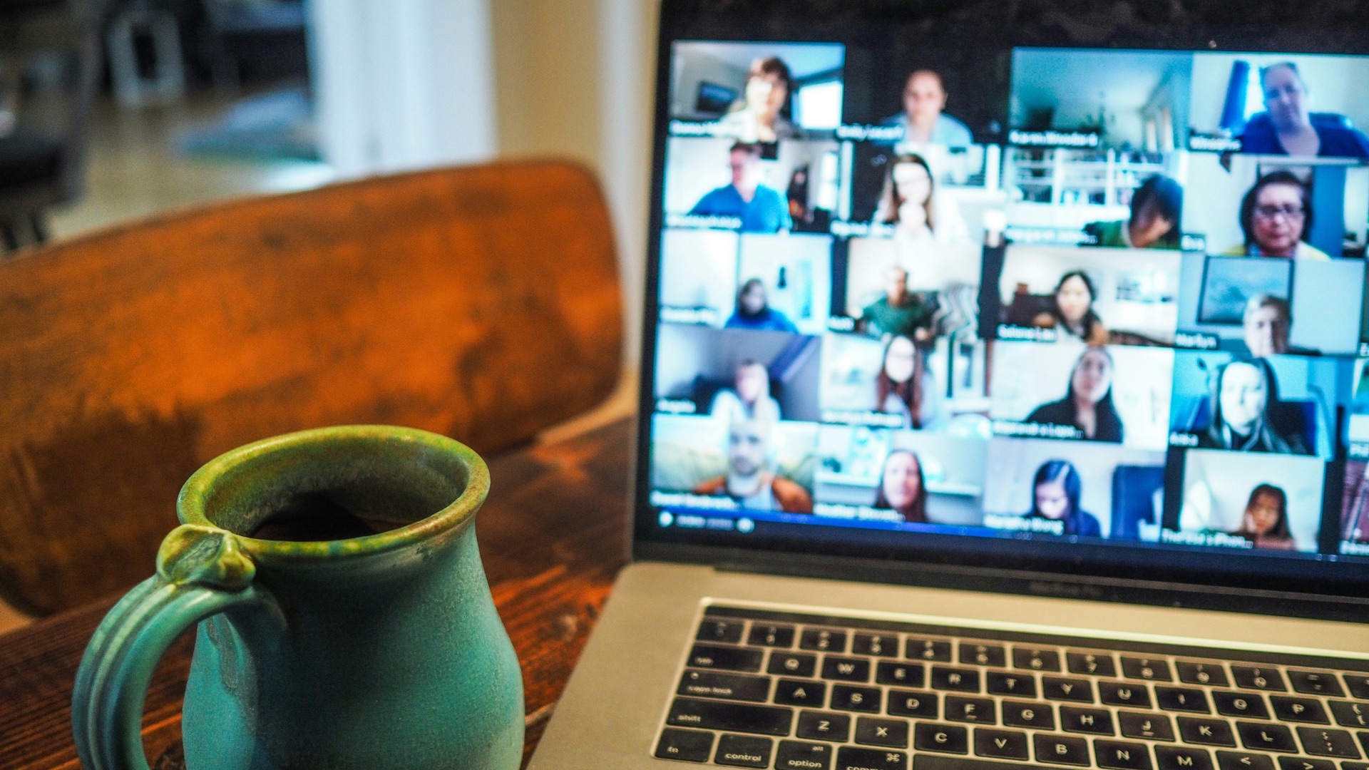 Video conference call on a laptop screen